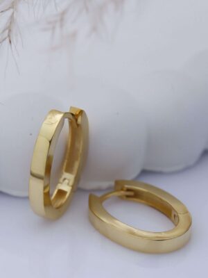 Creolen-Ohrringe aus Silber mit Goldplattierung.