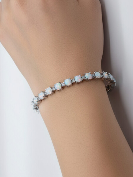 Tennis-Armband aus massivem Silber und 22 weißen Opalen, und Zirkonia - am Handgelenk